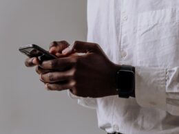 Black man using smartphone