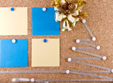 New Year's resolutions corkboard with sticky notes