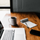 Keyboard and notepad to work on table in an IMage from Unsplash