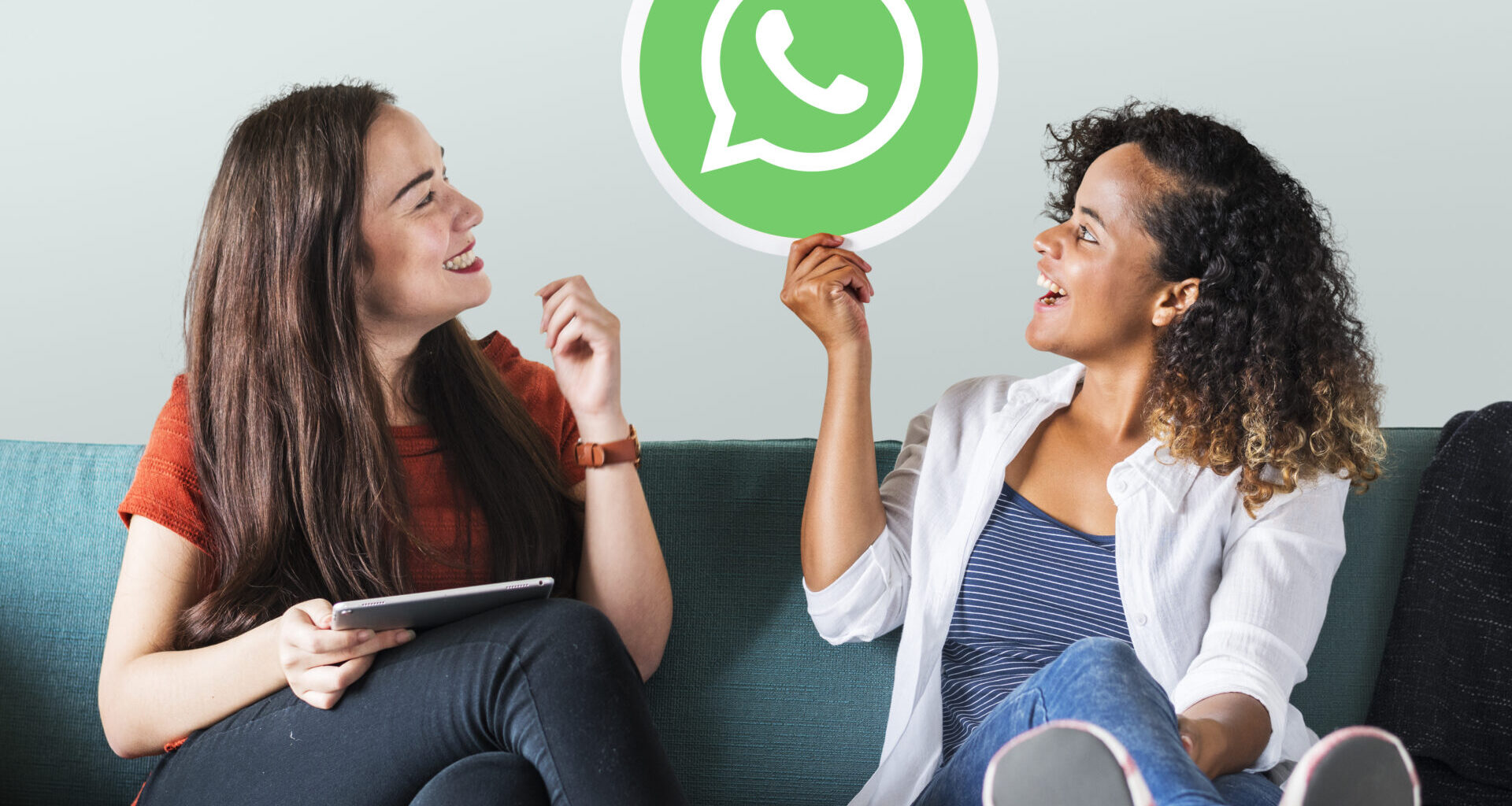 Young women showing a WhatsApp image