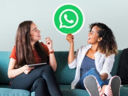 Young women showing a WhatsApp image