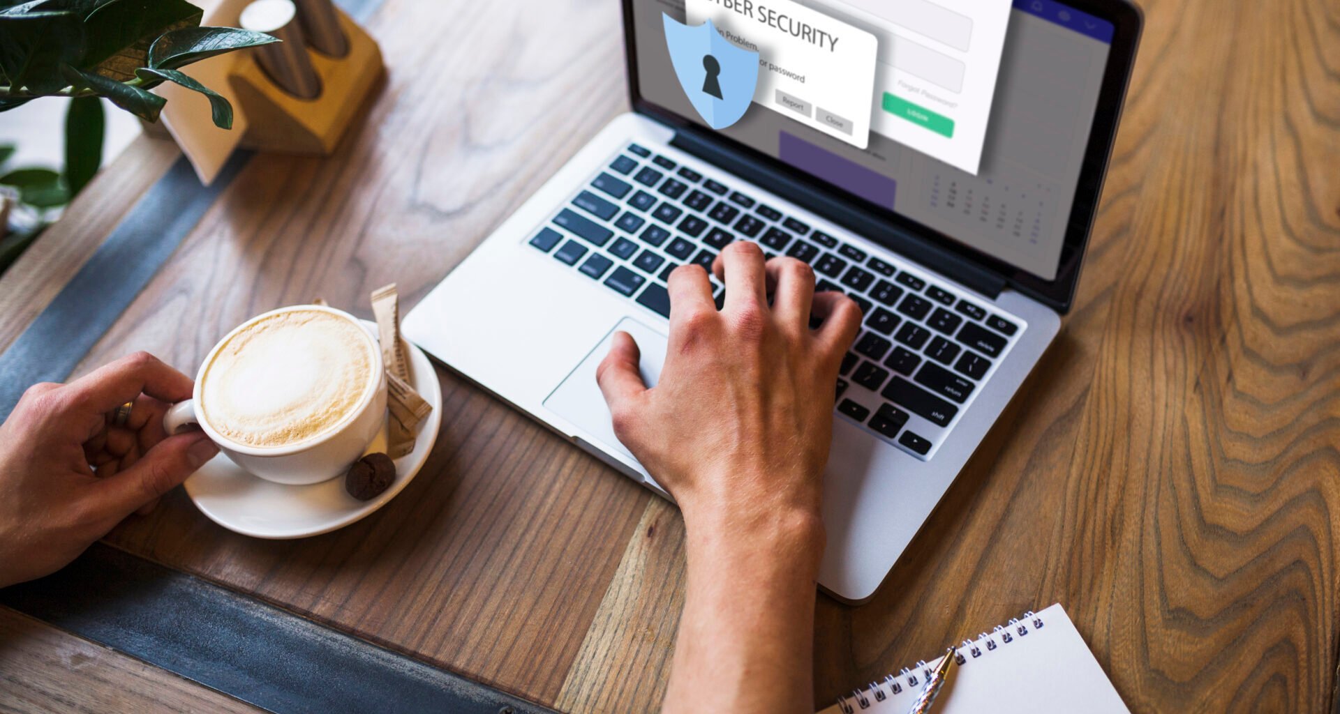 Woman working with laptop and cup of coffee and a password protected screen